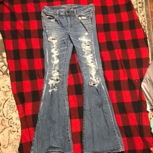 Denim jeans with holes